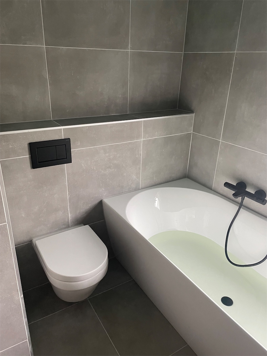 Badkamer groene wandtegel